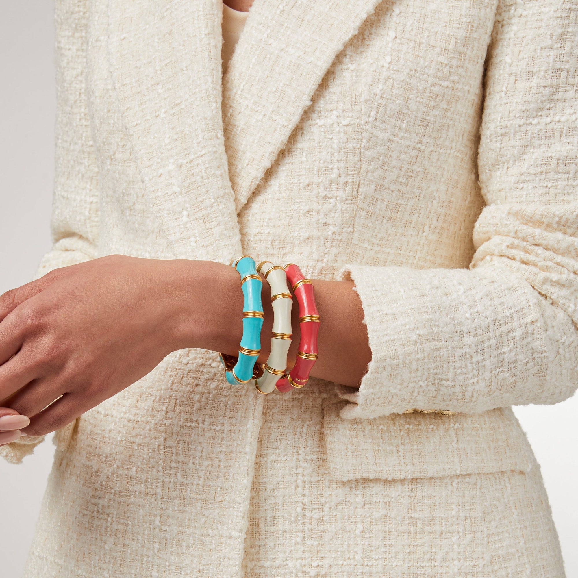 carousel, Bamboo Hinge Bangles in three different colors on model's arm
